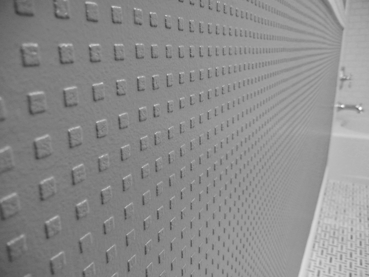 Devine paint textured wall paper close up 